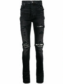 Amiri Boucle MX1 Ripped Jeans in Black