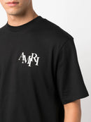 Amiri Staggered Logo T-Shirt in Black