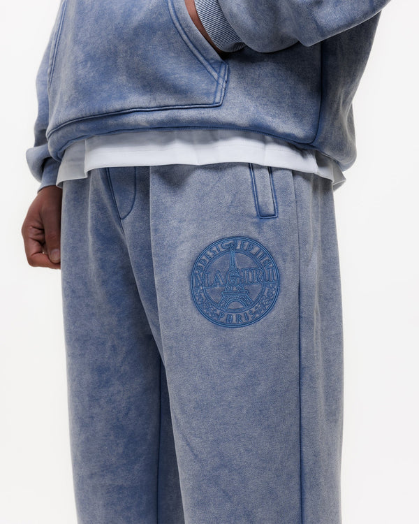 Magiri Embroidered Acid Wash Joggers in Washed Blue