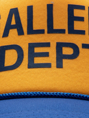 Gallery Dept Logo Trucker Cap in Navy Yellow