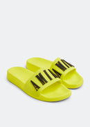 Amiri Core Logo Embossed Sliders in Yellow/Black