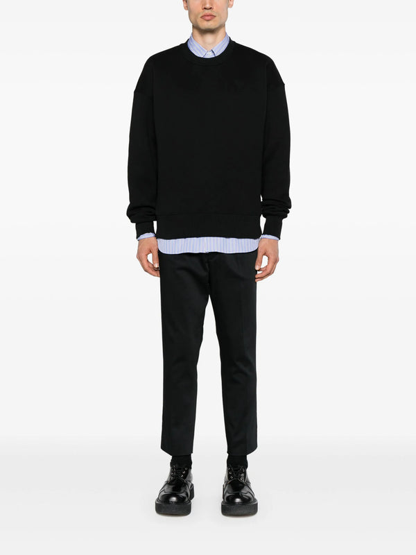 AMI Paris Ami De Coeur Embossed Logo Sweatshirt in Black